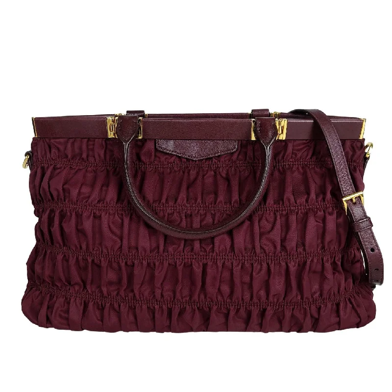 Prada Gaufre shoulder Bag in burgundy nylon and leather trim